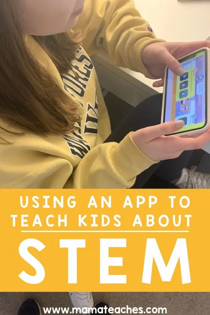 Using an App to Teach Kids About STEM - Girl using a STEM app on a smartphone
